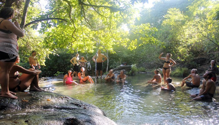 Mata Jitu Waterfall surrounded by tropical forest on Moyo Island