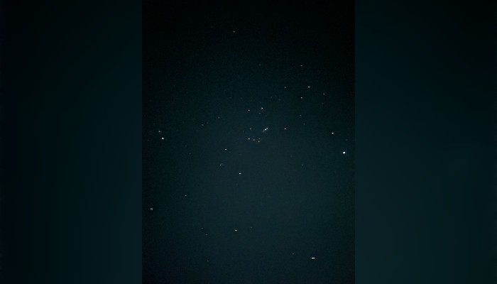 Milky Way glowing over a Komodo sailing boat at night during BOSE 4D3N tour in Indonesia.