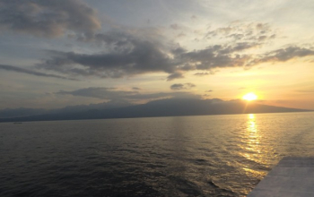 Mount Tambora volcano seen from the sea during Komodo sailing trip in Sumbawa Island, Indonesia.