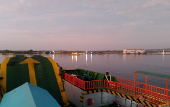 Kayangan Harbor in Lombok with ferries and blue sea, gateway to Labuan Bajo.